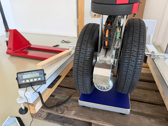 How do you build a durability test rig for a walking pad?