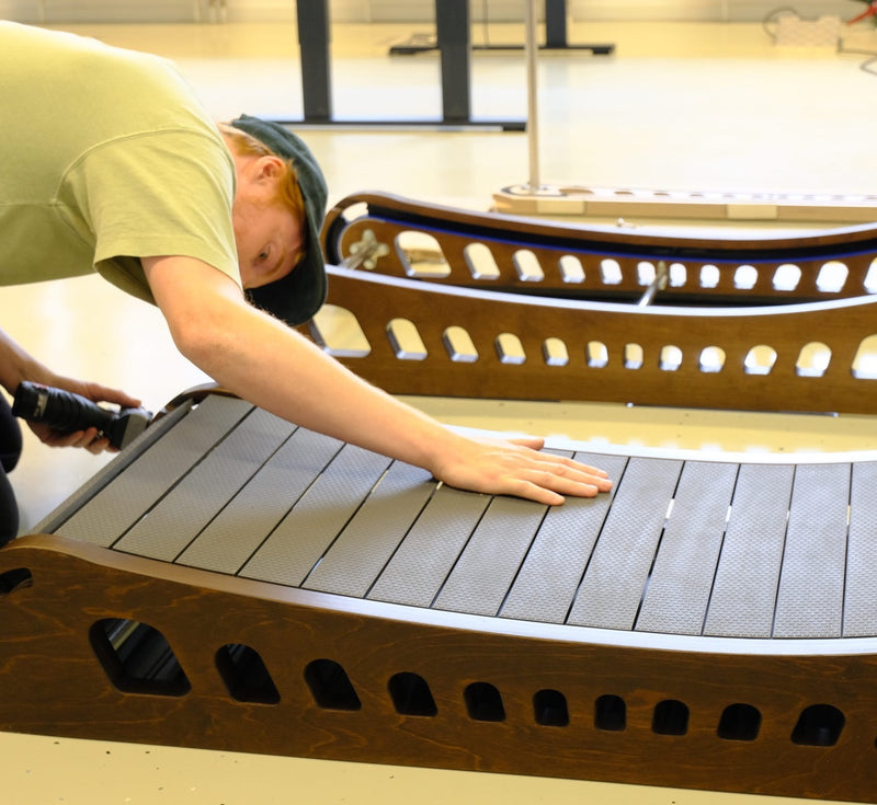 ASSEMBLED BY HAND