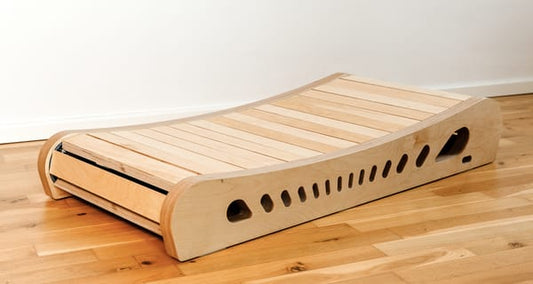 The Office Walker in the natural wood finish, on a wooden floor